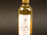 a bottle of wine that is sitting on a table