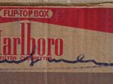 a box of marlboro cigarettes sitting on a table