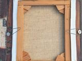 an image of a picture frame made out of a piece of wood