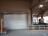an image of a garage with a garage door open
