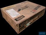 a cardboard box that is open on a black background