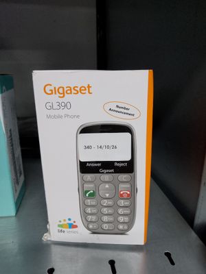 a box that has a phone in it on a shelf