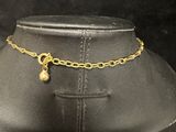 a close up of a necklace on a mannequin mannequin mannequin mannequin mannequin mannequin mannequin mannequin