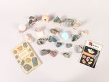 many different types of rocks and stones on the table