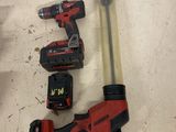 two tools that are sitting on a table