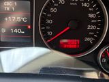 a close up of a car dashboard with a speedometer