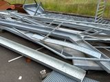 a pile of metal equipment that is laying on the ground