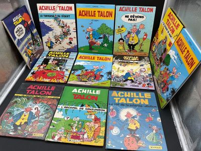 a lot of comic books on display in a display case