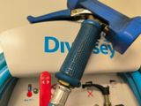 a blue hose with a blue handle and a blue hose attached to it