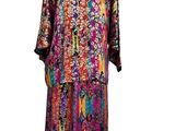 a women ' s multicolored dress on a mannequin mannequin mannequin mannequin mannequin mannequin mannequin mann