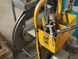 a picture of a machine that is sitting in a warehouse