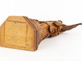 a wooden umbrella with a wooden handle on a white background