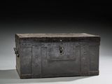 an old metal box with a lock on the top of it