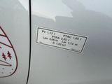 a sticker on the side of a car that has a sticker on it