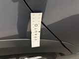 a measuring tape attached to the side of a car
