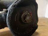 an image of a sander on a wooden table