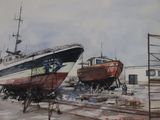 deux bateaux qui sont posés à terre l'un à côté de l'autre
