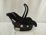a baby car seat with a handle attached to it