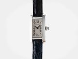 a close up of a watch on a black strap with a white background