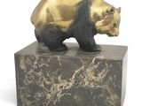 statue of a bear on a marble base on a white background
