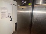 an image of a stainless steel refrigerator in a kitchen
