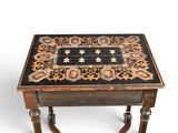 an image of a small table with a black and orange design