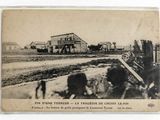 an old photo of a farm in the middle of the day