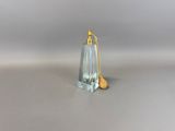 a small glass bottle with a gold top and a small glass bottle with a gold top