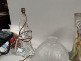 two vases and a phone on a table