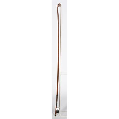 an image of a tall wooden pole with a long handle