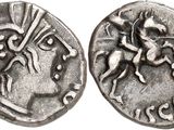 a silver coin with an image of a horse and rider on it