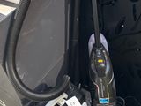 a picture of a vacuum and other household items on the ground