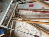 a pile of tools that are laying on the floor