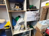 a room filled with lots of clutter and tools