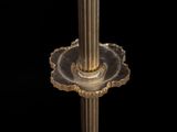 a close up of a table lamp on a black background