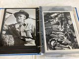 a black and white photo of a man in a cowboy hat