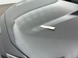 a sticker on the hood of a sports car