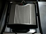 a grill that has a grill on top of it