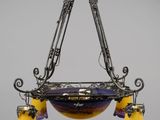 a close up of a chandelier hanging from a ceiling