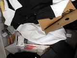 a box full of clothes and other items that are in it