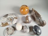 many different types of rocks on a white surface