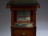 an image of a small wooden table with a marble top