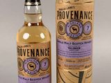 a bottle of provenance whisky next to a cardboard box