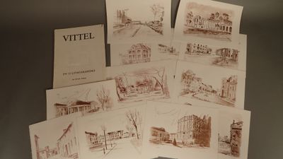 une pile de vieilles cartes postales sur lesquelles figurent des photos de bâtiments
