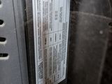 a close up of a metal object with a tag on it