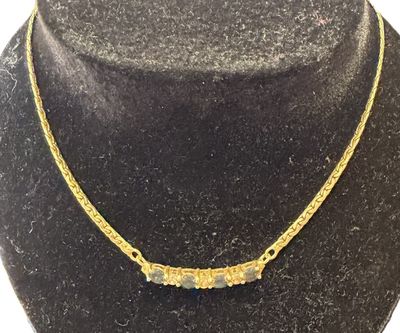 a close up of a necklace on a mannequin mannequin mannequin mannequin mannequin mannequin mannequin mannequin