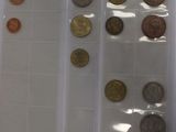 a lot of coins that are in a plastic bag
