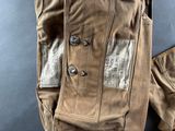 a close up of a pair of pants with buttons on them