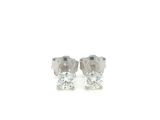 a pair of diamond stud earrings on a white background