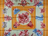an image of a square scarf with a picture of a bunch of animals